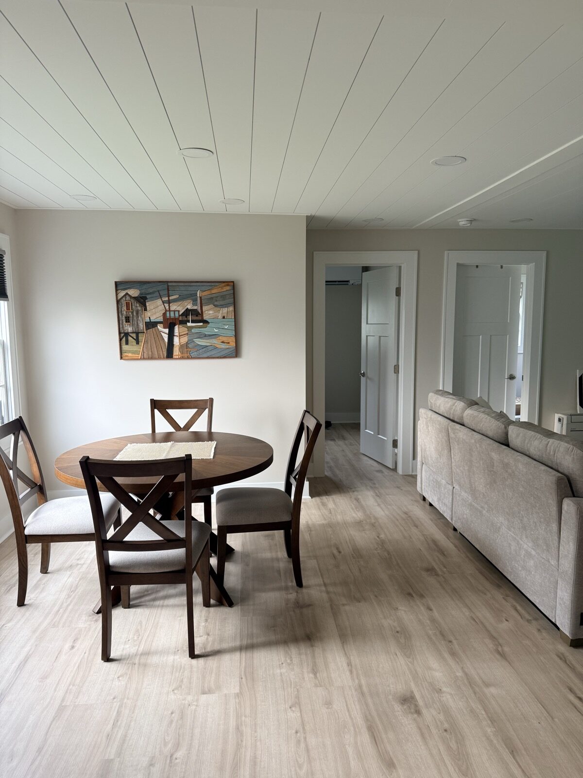 Updated Marblehead cottage living and dining area after remodel